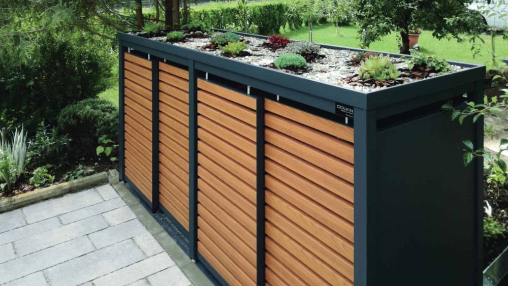 Müllbehälterbox Styleout Linis mit Holzbelattung und Gründach